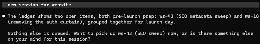 Terminal output of a new session auto-orienting from the ledger: two open pre-launch items surfaced, with a prompt to pick one up.